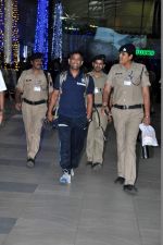 Mahendra Singh Dhoni snapped at the airport in Mumbai on 9th Nov 2013